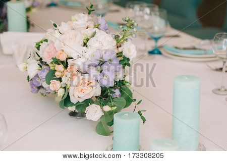 A Little Composition Of Petals And Candles, White And Pink Roses And Other Flowers