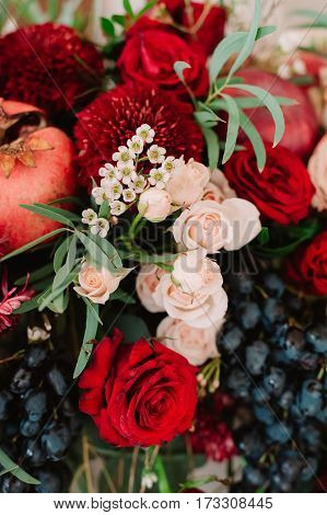 Autumnal Wedding Bouquet Of Roses, Apples, Grape And Pomergranate, In Red Colour, Closeup