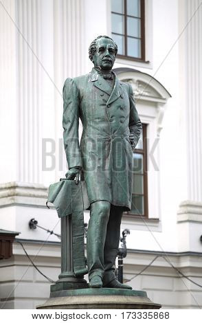 Statue of Nils Ericson in front of Stockholm Central Station and Stockholm Central Train Station in Stockholm Sweden
