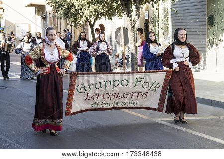 SELARGIUS, ITALY - September 14, 2014: Former marriage Selargino - Parade of folk group 