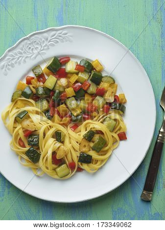 close up of rustic healthy italian pasta primavera