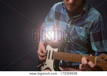 Hands Of Man Playing Electric Guitar.