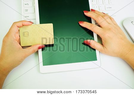 Woman's Hands Holding Credit Card And Using Laptop. Online Shopping