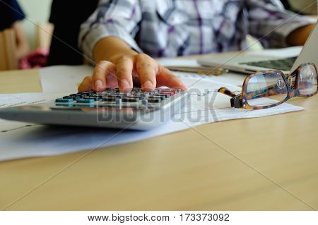 Business Man Hand Pointing At Business Document During Discussion At Meeting