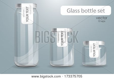 Set of transparent glass bottles. Realistic banks. Isolated on a gray background. Set of different size cans with decals. Labeled cans for dairy products