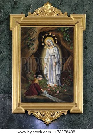 ROME, ITALY - SEPTEMBER 01: Our Lady of Lourdes in chapel of Nostra Signora di Lourdes in Santa Maria in Aquiro church in Rome, Italy  on September 01, 2016.
