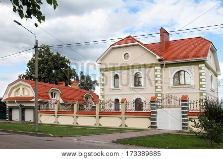 BORISOGLEBSK VORONEZH OBLAST RUSSIA- JULY 21 2015: Modern stone house on the street.