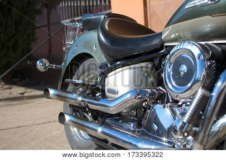 Subotica, Serbia -February 25,2017:Green Yamaha Drag Star 1100 motorcycle in front of the garage, photographed on a nice sunny day. Ready for restoration.