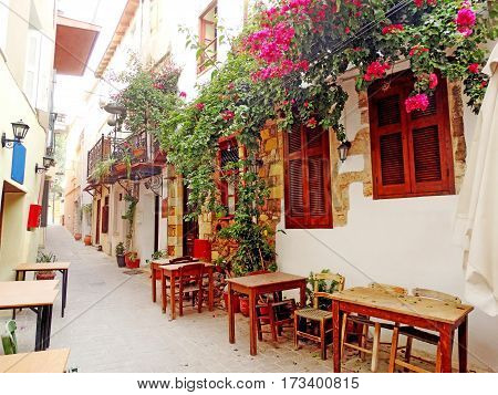 door architecture detail in house building with bougainvillea Greece