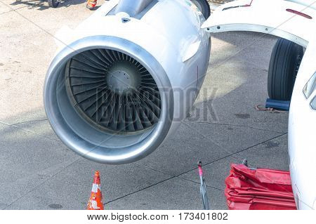 Close-up detail of aircraft jet engine of a commercial aircraft.