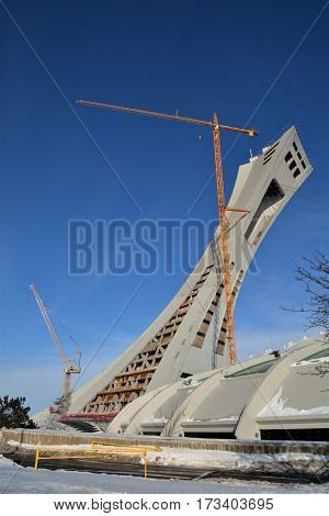 MONTREAL CANADA 02 07 2017. Under repair the Montreal Olympic Stadium  tower. It's the tallest inclined tower in the world.Tour Olympique stands 175 meters tall and at a 45-degree angle