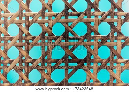A macro photo of old wooden basketwork.