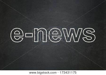 News concept: text E-news on Black chalkboard background