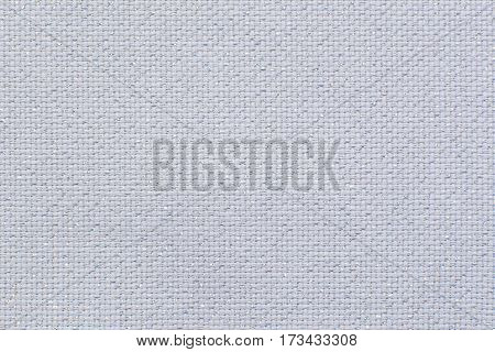 Natural white linen fabric with shining sparkles. Texture for the background