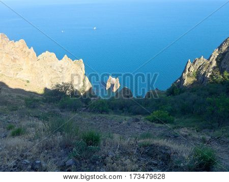 Crimean landscape of extinct Karadag volcano. Golden gate rock