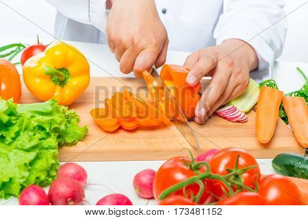 Preparation Of Cutting Vegetables For Salad, Close Up Hands Of Chef With Knife