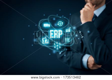 Enterprise resource planning ERP concept. Businessman think about ERP business management software for collect, store, manage and interpret business data about customers, HR, production, logistics, financials and marketing.