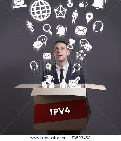 Business, Technology, Internet And Network Concept. Young Businessman Shows The Word: Ipv4