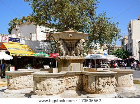 HERAKLION, CRETE - SEPTEMBER 19, 2016 - View of the Morosini fountain in Lions Square in the city centre Heraklion Crete Greece Europe, September 19, 2016.