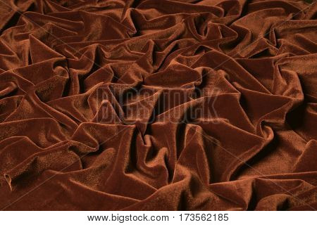 beautiful draping a brown velvet on the table