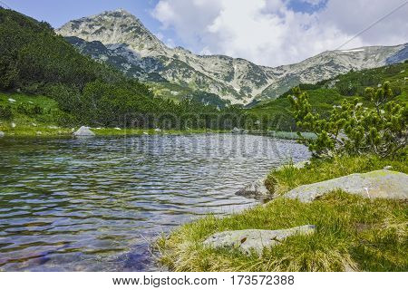 Landscape with Reflection of Muratov peak in river,  Pirin Mountain, Bulgaria
