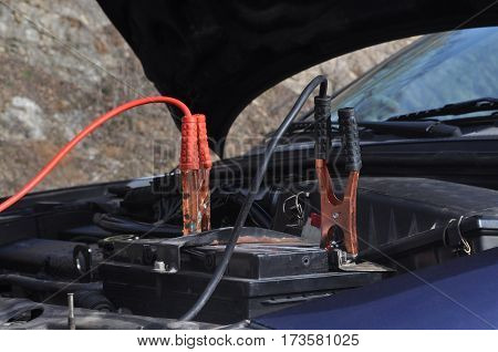 Cables for switching the battery on the car, recharging battery on the road. Start engine.