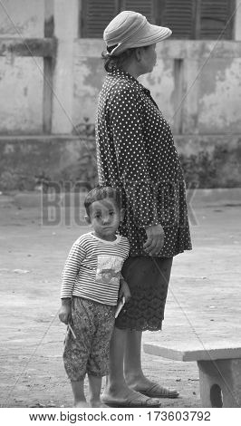 PHNOM PHEN, CAMBODIA MARCH 23: Unidentified mother with her child on march 23 2013 in Phnom Phen,Cambodia. Maternal and Child Mortality as the top priority of the  Royal Government of Cambodia