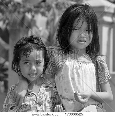 PHNOM PHEN, CAMBODIA MARCH 23: Unidentified street children posing on march 23 2013 in Phnom Phen,Cambodia.In Phnom Penh alone there are between 10,000 and 20,000 children live and work on the streets