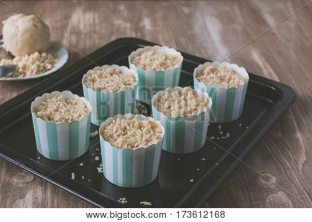 Making Muffins, Adding Streusel To The Pastry