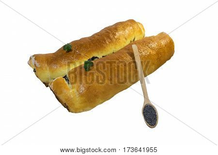 Oppy roll baked at home with sprigs of mint with a wooden spoon filled with grains of poppy whith shadows. Isolated on white background.