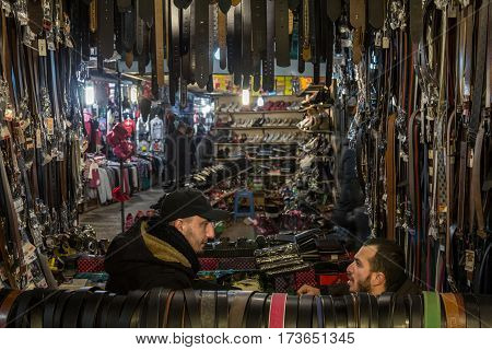 GJILAN - GNJILANE KOSOVO - JANUARY 02 2016: Salesmen in the local bazaar selling belts