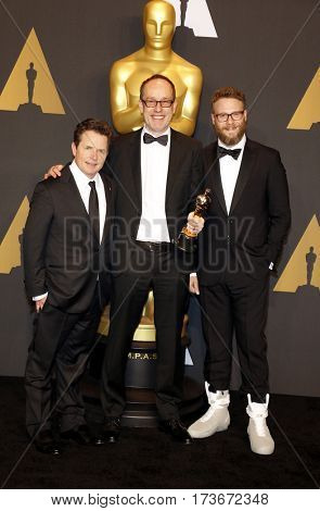 John Gilbert, Seth Rogen and Michael J. Fox at the 89th Annual Academy Awards - Press Room held at the Hollywood and Highland Center in Hollywood, USA on February 26, 2017.