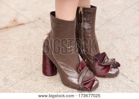 MILAN ITALY - FEBRUARY 23: Detail of shoes outside Genny fashion show during Milan Women's Fashion Week on FEBRUARY 23 2017 in Milan.