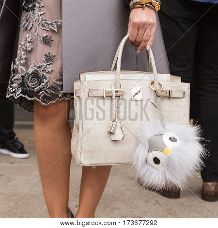 MILAN ITALY - FEBRUARY 23: Detail of bag outside Genny fashion show during Milan Women's Fashion Week on FEBRUARY 23 2017 in Milan.