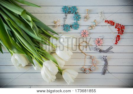 beautiful women's accessories on wooden background for shop or site