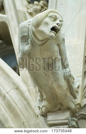 Gargoyle at the wall of the Basilique Saint-Nazaire-et-Saint-Celse in Carcassonne, France.
