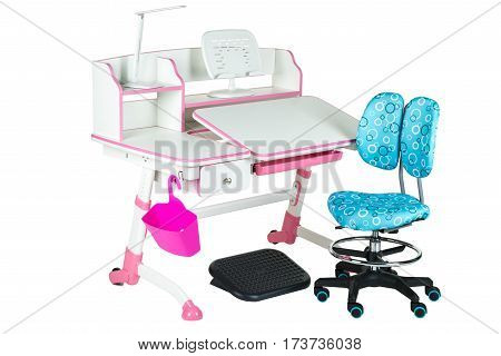 Blue chair pink school table pink basket desk lamp and black support under legs on the white isolated background.