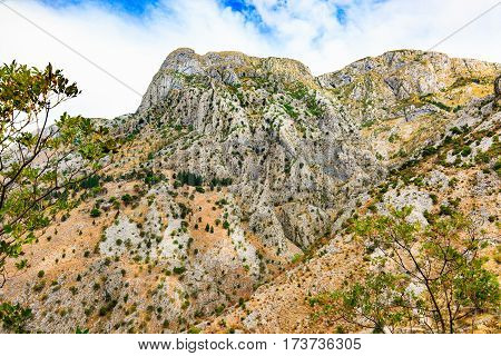 Mountain landscape. Overhanging cliffs, rocky slopes of Lovcen mountain range.
