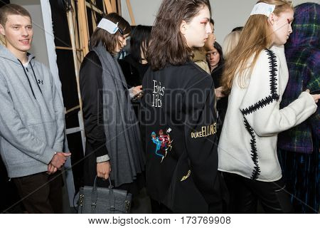 MILAN ITALY - FEBRUARY 22: Gorgeous models pose in the backstage just before Wunderkind show during Milan Women's Fashion Week on FEBRUARY 22 2017 in Milan.