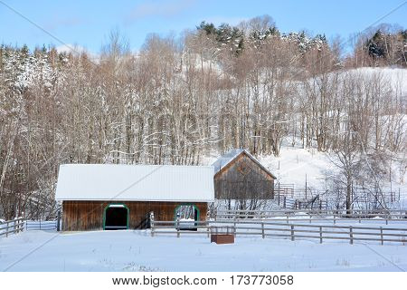 BROMONT QUEBEC CANADA 02 02 2017: Winter landscape old farm in country side of Bromont it is in the Brome-Missisquoi Regional County Municipality