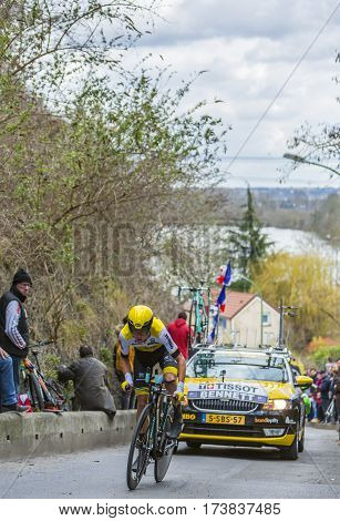 Conflans-Sainte-HonorineFrance-March 62016: The New Zealand cyclist George Bennett of Lotto NL-Jumbo Team riding during the prologue stage of Paris-Nice 2016.