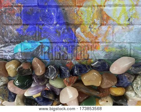 Background of various beautiful gemstones on painting wall decoration texture.