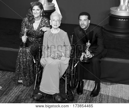 Katherine Johnson, Ezra Edelman and Caroline Waterlow at the 89th Annual Academy Awards - Press Room held at the Hollywood and Highland Center in Hollywood, USA on February 26, 2017.