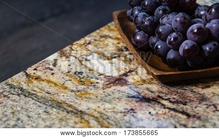 stone surface part of modern kitchen worktop made of granite natural stone, kitchen surface