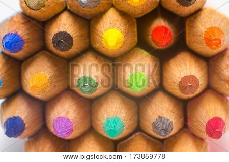 close up of colored pencils on isolated white background