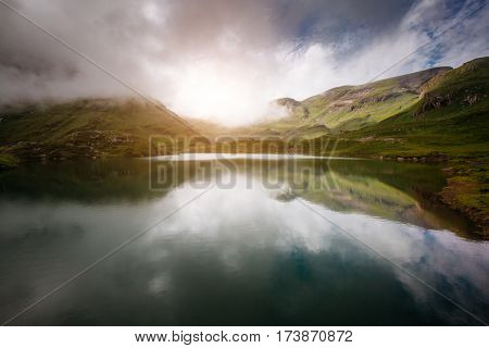Great view of the mystic lake. Popular tourist attraction. Picturesque and gorgeous scene. Location place Bachalpsee in Swiss alps, Grindelwald valley, Bernese Oberland, Europe. Beauty world.