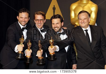 Dan Lemmon, Andrew R. Jones, Adam Valdez and Robert Legato at the 89th Annual Academy Awards - Press Room held at the Hollywood and Highland Center in Hollywood, USA on February 26, 2017.
