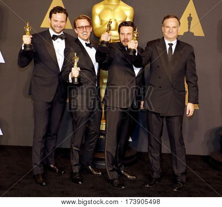 Dan Lemmon, Andrew R. Jones, Adam Valdez and Robert Legato at the 89th Annual Academy Awards - Press Room held at the Hollywood and Highland Center in Hollywood, USA on February 26, 2017.