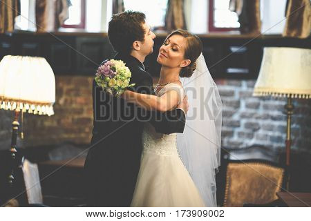 Bride Valses With Groom With Closed Eyes