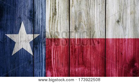 Texas flag on wood texture background. Abstract Flag background.